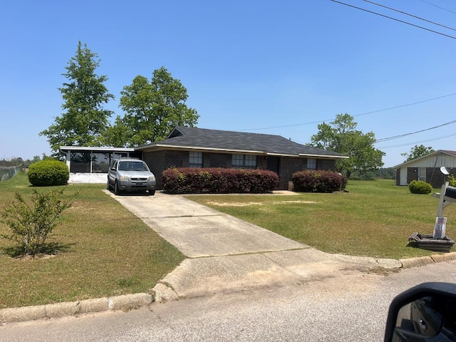 404 Terrace Dr, Headland, AL 36345 - ranch-style home featuring concrete driveway and a front yard