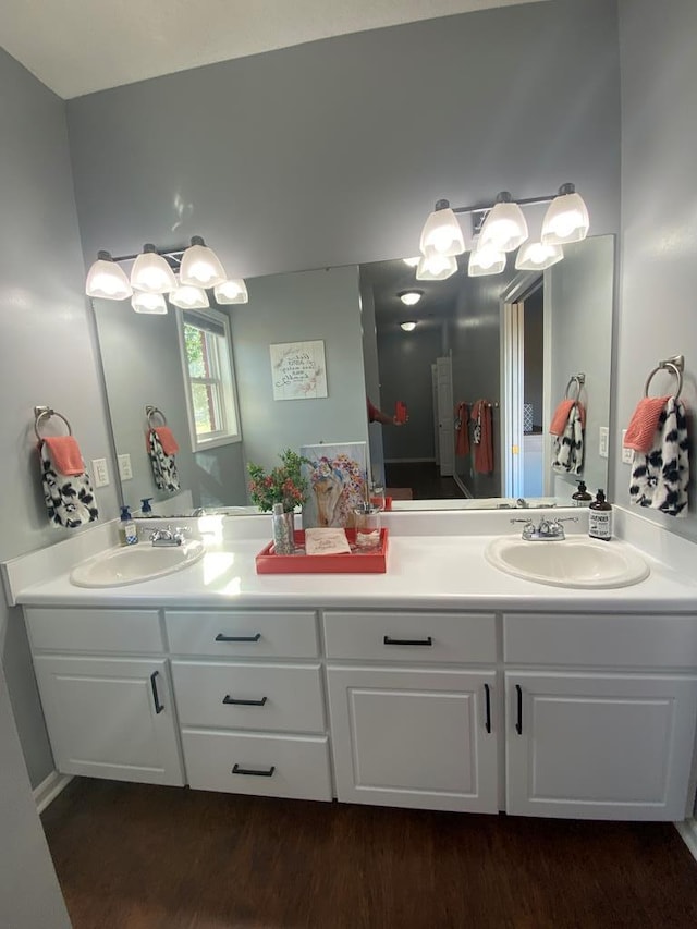 441 N Bay Springs Rd, Dothan, AL 36303 - bathroom featuring double vanity and wood finished floors