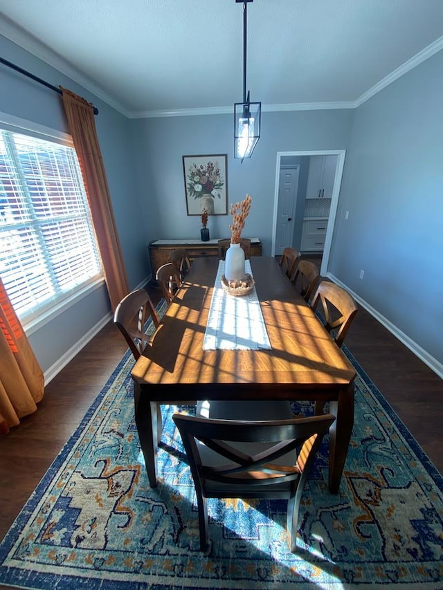441 N Bay Springs Rd, Dothan, AL 36303 - dining space featuring baseboards, wood finished floors, and ornamental molding