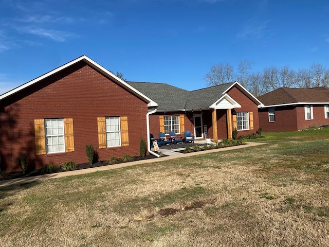 441 N Bay Springs Rd, Dothan, AL 36303 - ranch-style home with brick siding and a front lawn