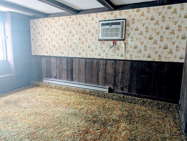 108 Imperial Dr, Eufaula, AL 36027 - spare room featuring wallpapered walls, a wainscoted wall, a baseboard heating unit, and an AC wall unit