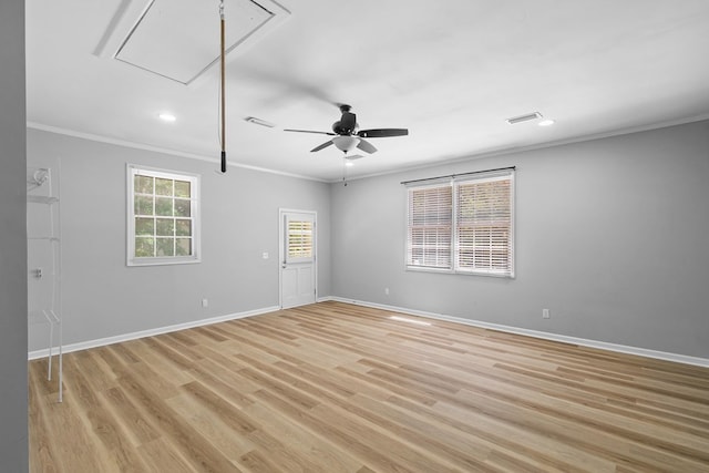 1005 Rampart Dr, Dothan, AL 36303 - spare room featuring attic access, crown molding, light wood-style floors, recessed lighting, and ceiling fan