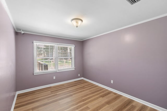 1005 Rampart Dr, Dothan, AL 36303 - unfurnished room featuring crown molding and wood finished floors