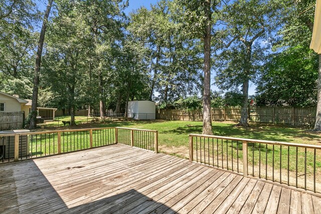 1005 Rampart Dr, Dothan, AL 36303 - wooden deck with a fenced backyard and a shed