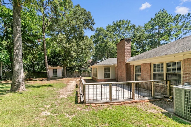 1005 Rampart Dr, Dothan, AL 36303 - fenced backyard with a storage unit and a patio