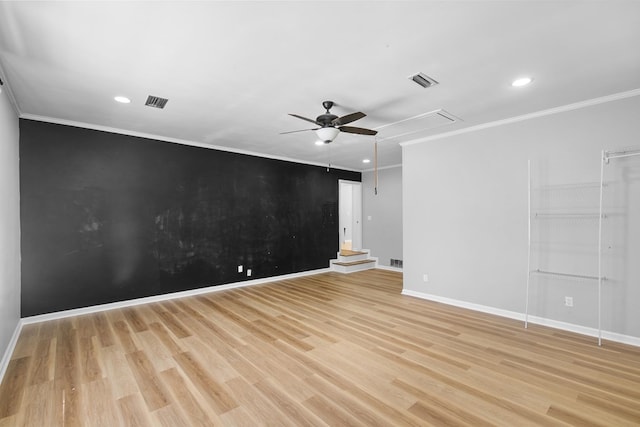 1005 Rampart Dr, Dothan, AL 36303 - empty room with a ceiling fan, light wood-type flooring, attic access, recessed lighting, and crown molding