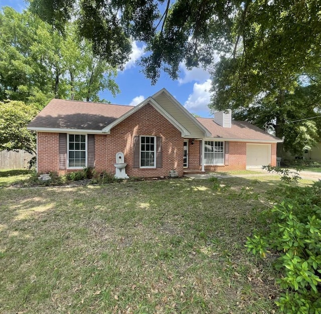 single story home featuring brick siding, a garage, and a chimney