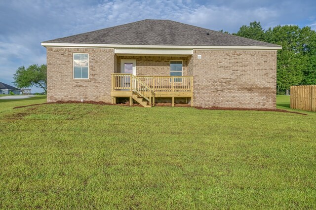 1017 Sandbed Rd, Newton, AL 36352 - back of property featuring brick siding, a lawn, and a shingled roof