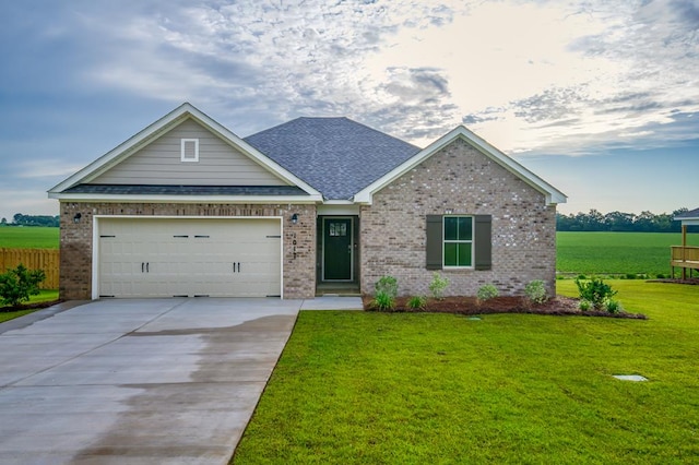 1017 Sandbed Rd, Newton, AL 36352 - view of front of property with brick siding, driveway, roof with shingles, and a garage