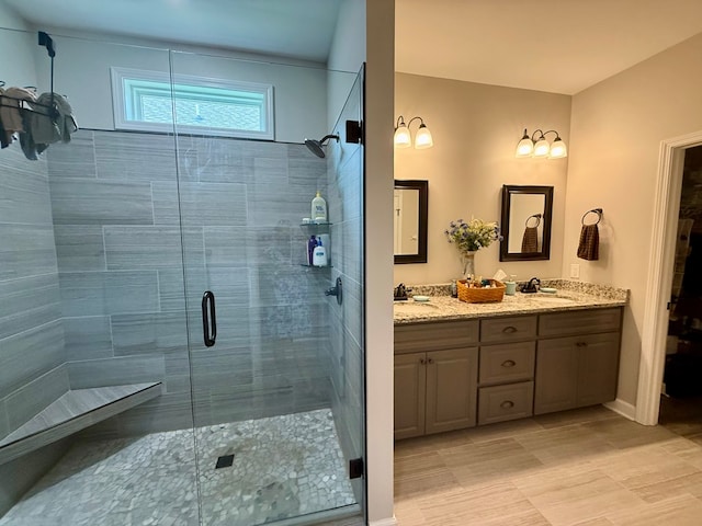 106 Sandpiper Ln, Dothan, AL 36301 - bathroom with a shower stall and double vanity