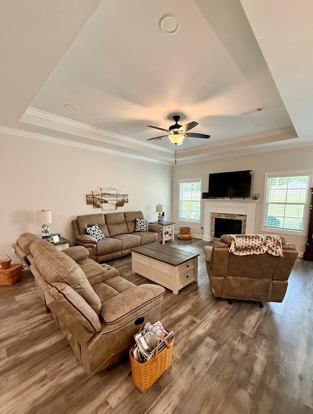 106 Sandpiper Ln, Dothan, AL 36301 - living area with a raised ceiling, plenty of natural light, dark wood-style flooring, and crown molding