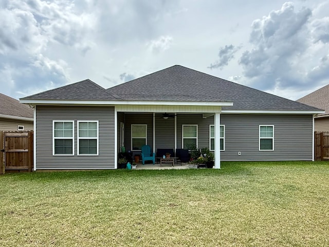 106 Sandpiper Ln, Dothan, AL 36301 - back of house featuring a patio area, a ceiling fan, roof with shingles, and a gate