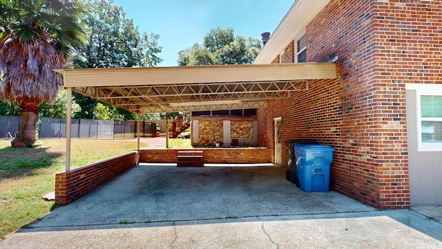 view of patio / terrace featuring a carport