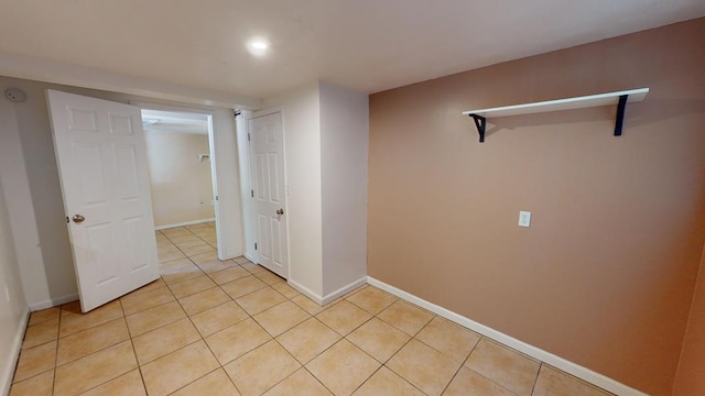 interior space with light tile patterned floors