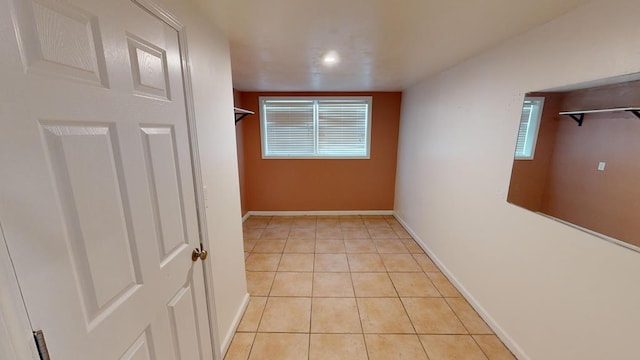 walk in closet featuring light tile patterned floors