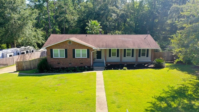 ranch-style house with a front lawn and a porch