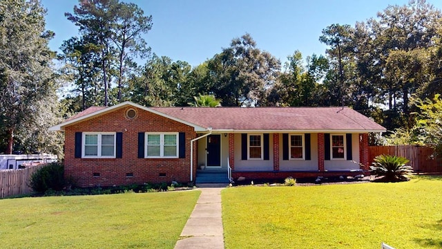 single story home featuring a front lawn