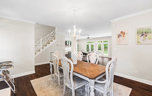 dining area with ceiling fan with notable chandelier, dark hardwood / wood-style flooring, and ornamental molding