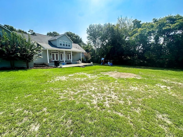 view of yard featuring a porch