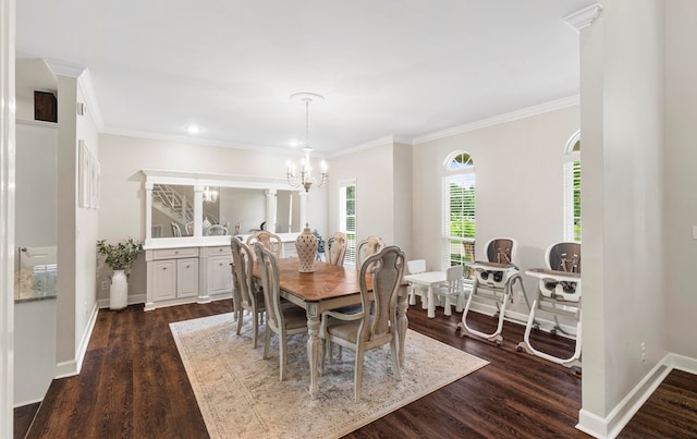 dining room featuring a chandelier, dark hardwood / wood-style flooring, and crown molding