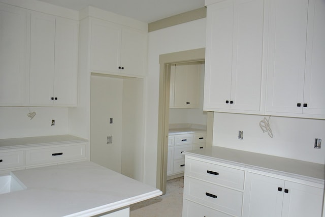 kitchen with white cabinetry