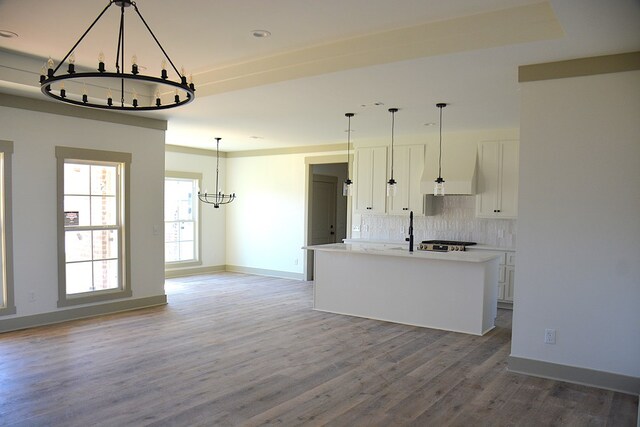 kitchen featuring white cabinetry and a center island