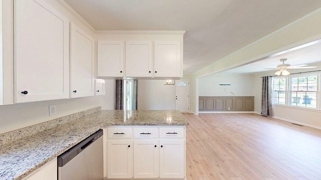 1007 Deborah St, Dothan, AL 36301 - kitchen featuring dishwasher, light wood-style flooring, a peninsula, white cabinets, and a ceiling fan