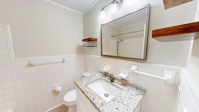 1007 Deborah St, Dothan, AL 36301 - bathroom featuring tile walls, crown molding, vanity, a shower, and wainscoting