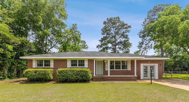 1007 Deborah St, Dothan, AL 36301 - ranch-style home featuring french doors and brick siding
