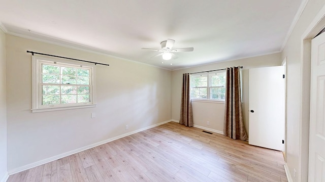 1007 Deborah St, Dothan, AL 36301 - unfurnished room featuring light wood-type flooring, ceiling fan, and ornamental molding