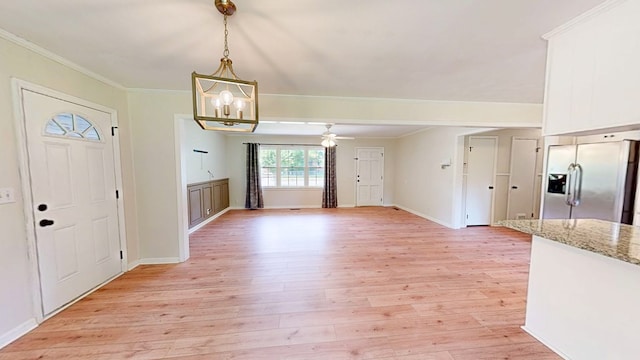 1007 Deborah St, Dothan, AL 36301 - foyer featuring light wood-style floors, crown molding, a chandelier, and ceiling fan