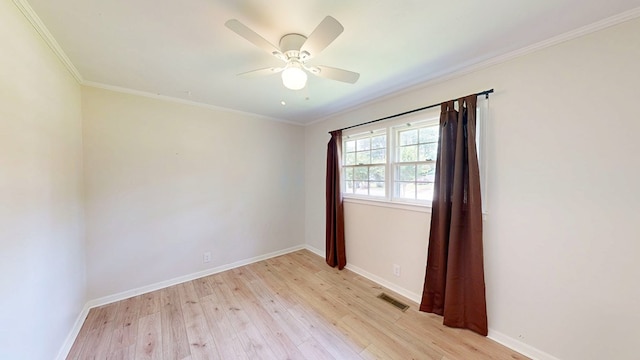 1007 Deborah St, Dothan, AL 36301 - empty room with light wood-style flooring, a ceiling fan, and crown molding