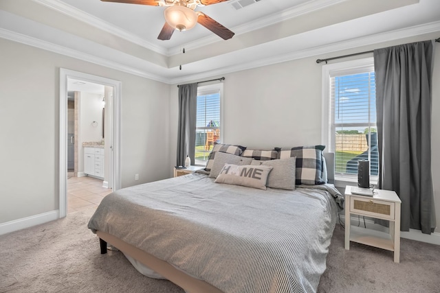 2027 S County Road 9, Newton, AL 36352 - bedroom featuring light carpet, ornamental molding, a raised ceiling, a ceiling fan, and ensuite bathroom