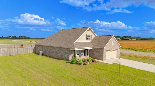 2027 S County Road 9, Newton, AL 36352 - view of front of property featuring concrete driveway, brick siding, roof with shingles, and an attached garage