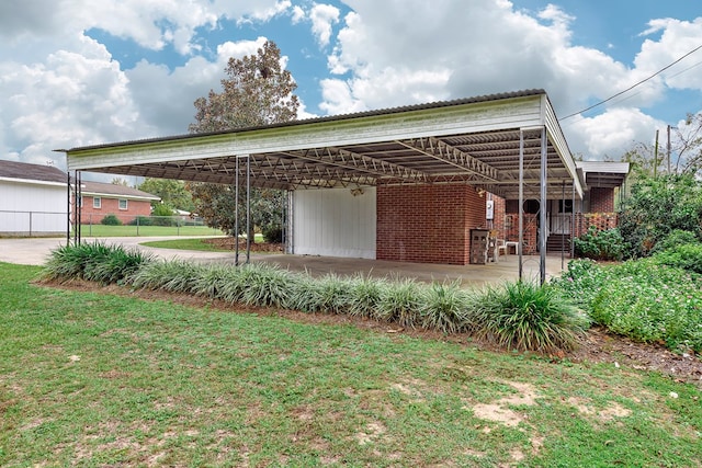 exterior space with a carport