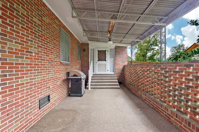 view of patio featuring a grill