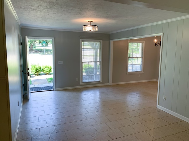 interior space featuring light tile patterned floors and plenty of natural light