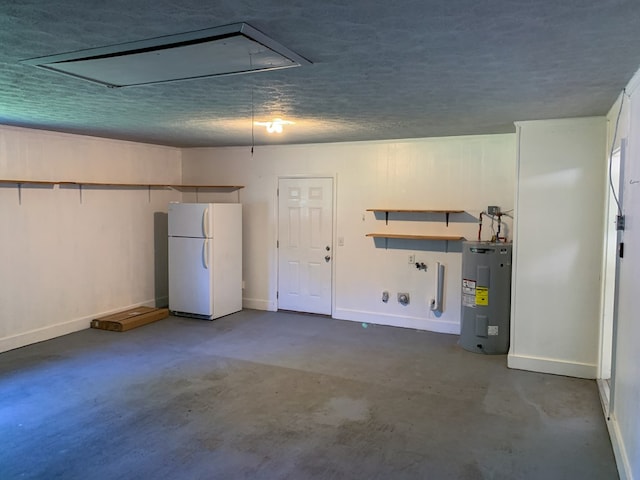 garage with electric water heater and white refrigerator