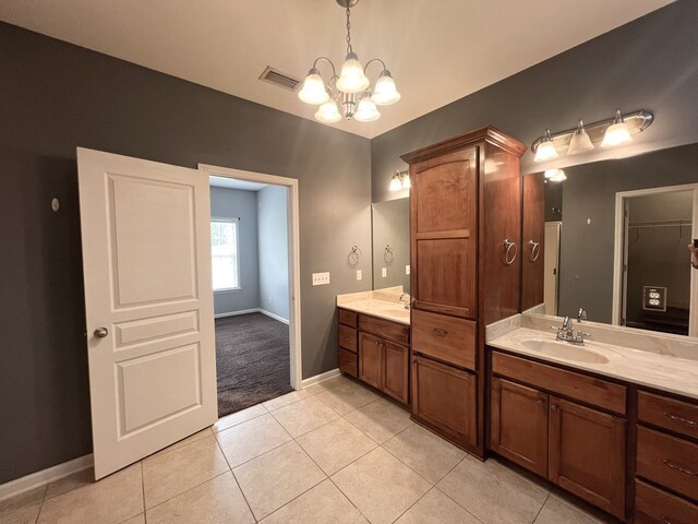 305 Millenia St, Enterprise, AL 36330 - bathroom with a chandelier, tile patterned floors, baseboards, and vanity