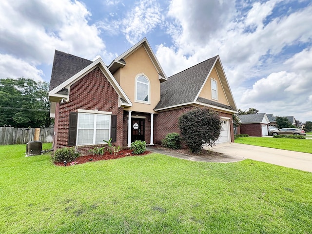 305 Millenia St, Enterprise, AL 36330 - traditional-style house with concrete driveway, brick siding, a garage, stucco siding, and roof with shingles