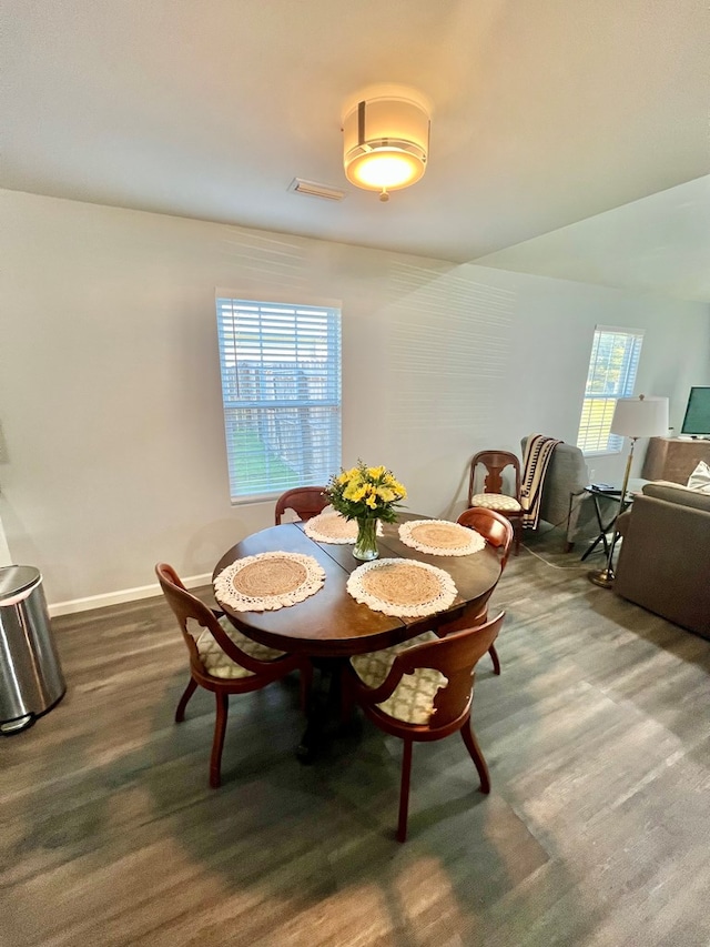 dining space with baseboards