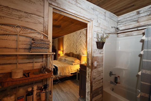 interior space featuring wood walls, wood ceiling, and hardwood / wood-style flooring