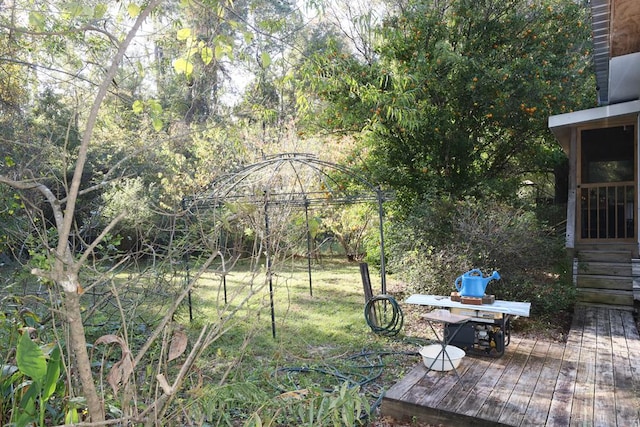 view of yard featuring a wooden deck