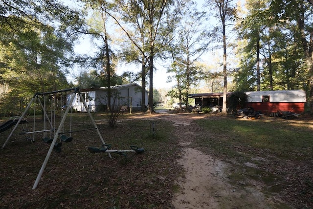 view of yard with a playground