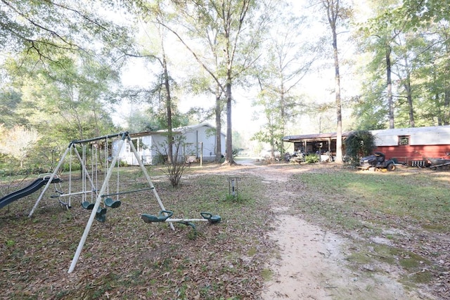 view of yard with a playground