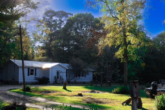 view of front of home with a front yard