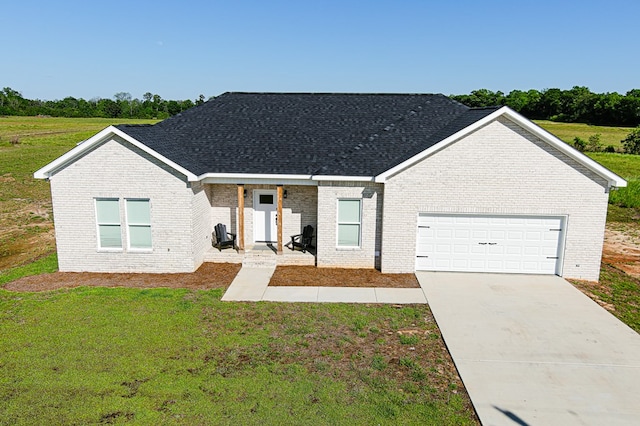 ranch-style home with a garage, concrete driveway, brick siding, and a front lawn