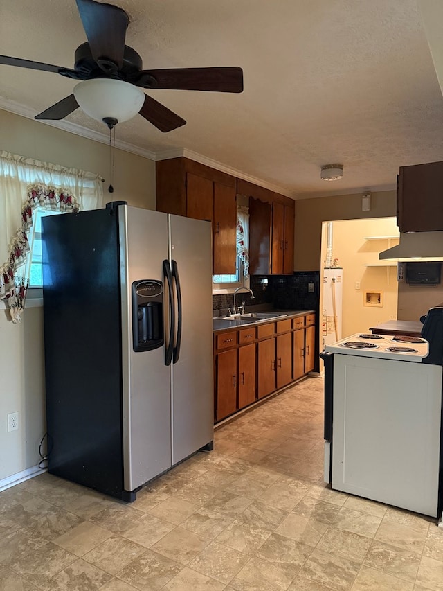 2303 Brown St, Dothan, AL 36303 - kitchen featuring stainless steel refrigerator with ice dispenser, white range with electric stovetop, a sink, ceiling fan, and decorative backsplash
