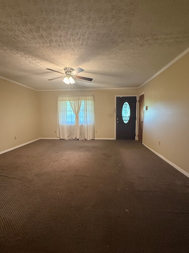 2303 Brown St, Dothan, AL 36303 - spare room featuring crown molding, a textured ceiling, baseboards, ceiling fan, and dark colored carpet