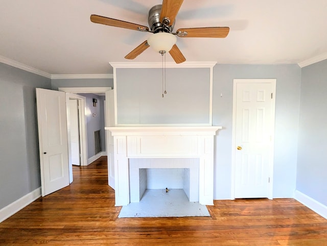 unfurnished living room featuring dark hardwood / wood-style floors, ceiling fan, and crown molding